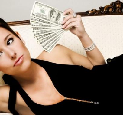 womanwithmoney-980x498