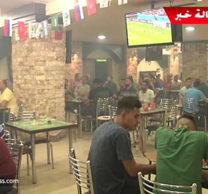 بالفيديو: كيف تابع المواطنين برام الله مباراة  المنتخب المصري مع نظيره الروسي؟!