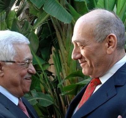 تفاصيل لقاء الرئيس عباس مع إيهود أولمرت في باريس 