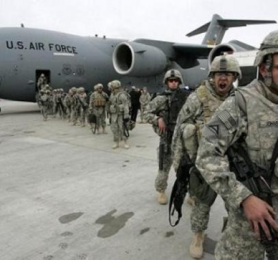 us-soldiers-arrived-from-afghanistan-stand-near-a-plane-at-the-us-airbase-30-km-outside-bishkek-in-manas-air-base