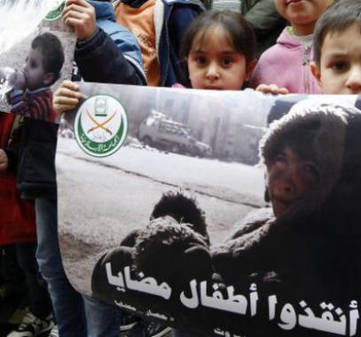 160115024241_placard_depicting_pictures_believed_to_be_for_children_from_the_syrian_town_of_madaya_640x360_epa