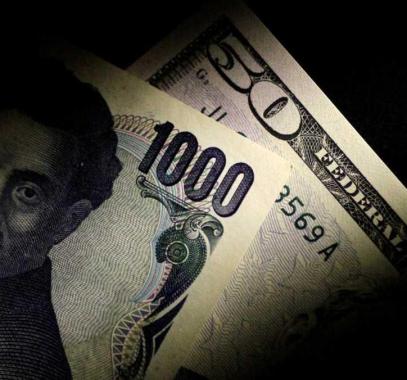 الدولار يسجل أعلى مستوى مقابل الين بعد فوز حزب آبي
