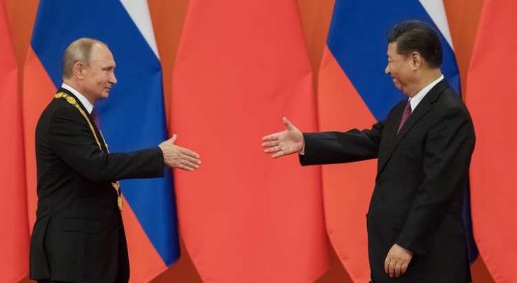 روسيا والصين توقعان اتفاقية تنص على الاستغناء عن الدولار الأمريكي