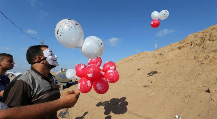 جيش الاحتلال يكشف عن كيفية رده على إطلاق البالونات الحارقة من غزّة