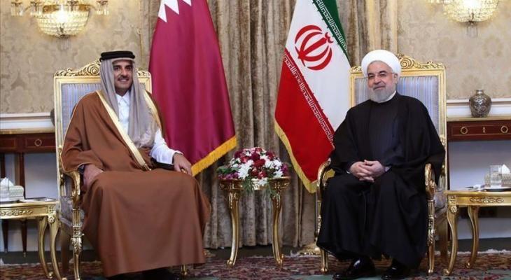 أمير قطر يستقبل الرئيس الإيراني بالدوحة.jpg