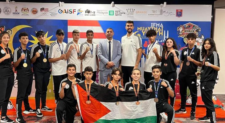 فلسطين تحصد 13 ميدالية ببطولتيّ العالم والأندية للعبة المواي تاي  في ماليزيا.jpg