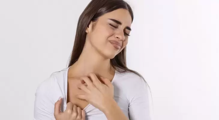 young-woman-scratching-her-neck-due-itching-gray-background-female-has-itching-neck-concept-allergy-symptoms-healthcare_3.jpg.webp