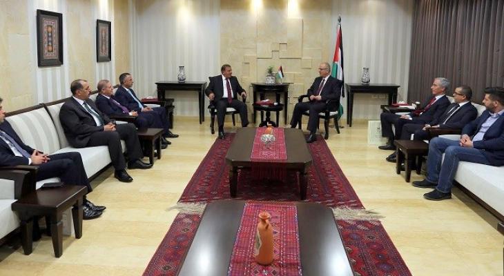 وفد حكومي فلسطيني يلتقي رئيس الهيئة المستقلة للانتخابات الأردنية.jpg