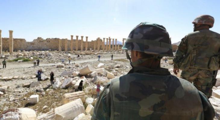 160402112242_soldiers_look_over_damage_at_the_historical_bel_temple_in_the_ancient_city_of_palmyra_in_the_central_city_of_homs_640x360_ap_nocredit