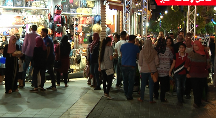 بالفيديو: عدسة وكالة "خبر" ترصد أجواء عيد الفطر بأسواق مدينة رام الله