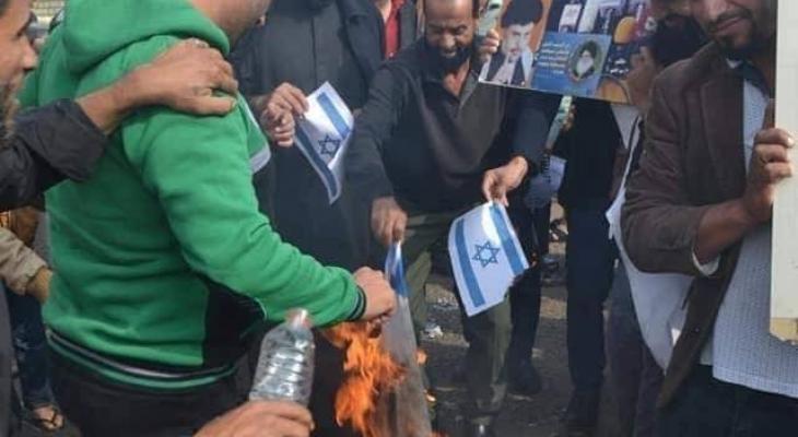 عراقيون يحرقون علم إسرائيل  2.jpg