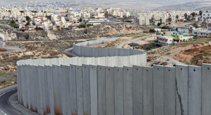 الاحتلال يستأنف بناء جدار الفصل حول قرية الولجة جنوب القدس.jpg