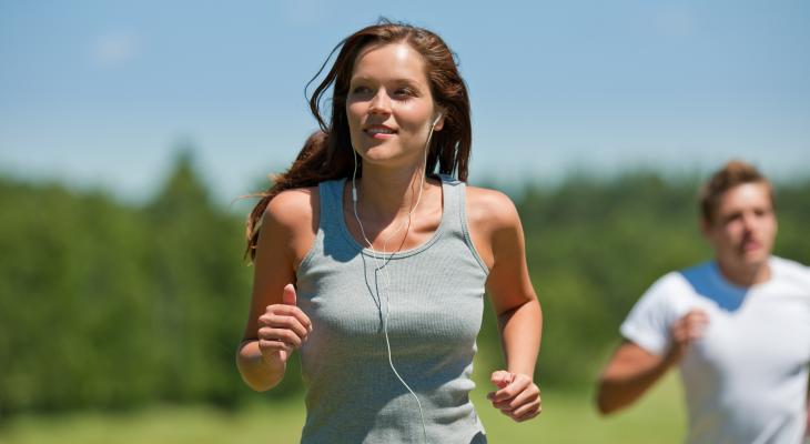 active-couple-headphones-healthy-jogging-man-meadow-music-nature-outdoors-people-running-sport-sportive-spring-summer-two-wellbeing-woman