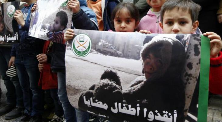 160115024241_placard_depicting_pictures_believed_to_be_for_children_from_the_syrian_town_of_madaya_640x360_epa