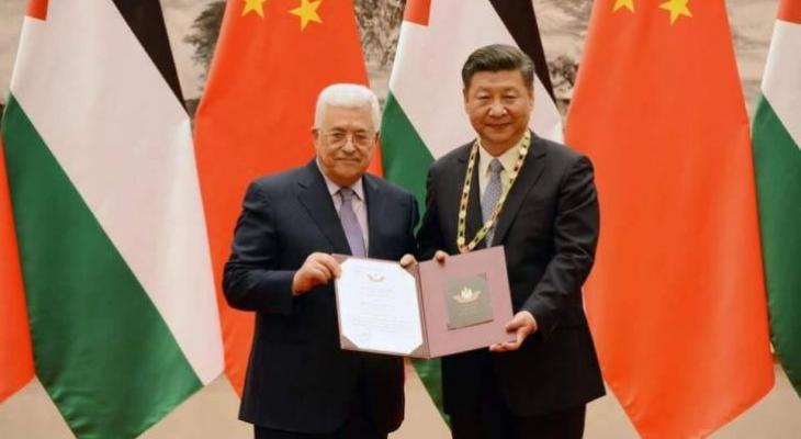 عباس والرئيس الصيني