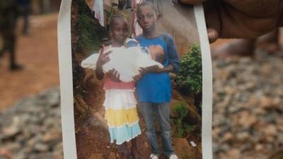_97506124_photographofyatta'stwodeadchildrenanddeadgrandchild.jpg