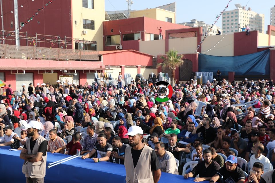 شاهد بالفيديو والصور: مهرجان دفع دية "40" شهيداً من ضحايا أحداث الانقسام في غزّة