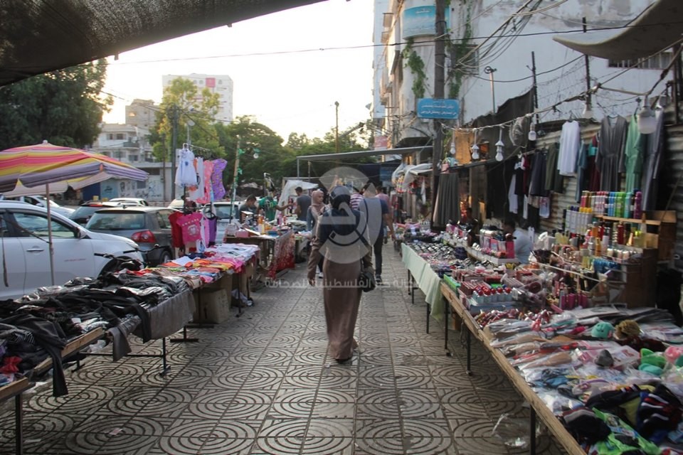 بالصور: عدسة وكالة "خبر" ترصد أجواء عيد الأضحى في أسواق قطاع غزّة