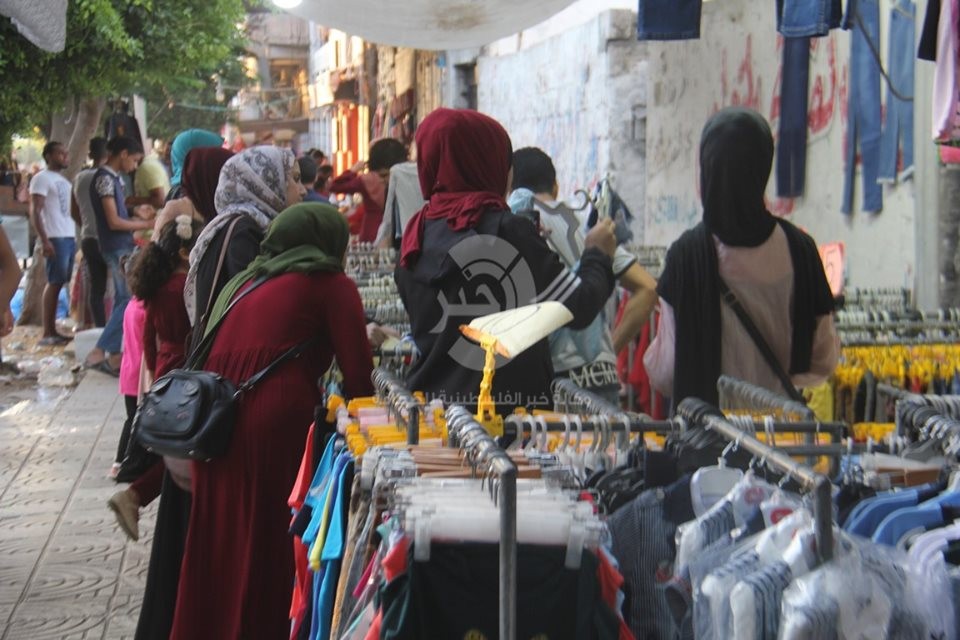 بالصور: عدسة وكالة "خبر" ترصد أجواء عيد الأضحى في أسواق قطاع غزّة