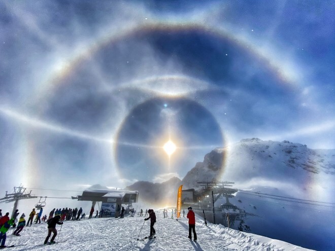 بالصور: فاتنة لـ"هالة جليدية" تطوق الشمس فوق "جبال الألب" السويسرية