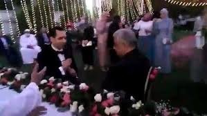 بالفيديو: زواج في زمن "كورونا" المأذون بلا منديل والعروسان على بعد أمتار عن الحضور في مصر