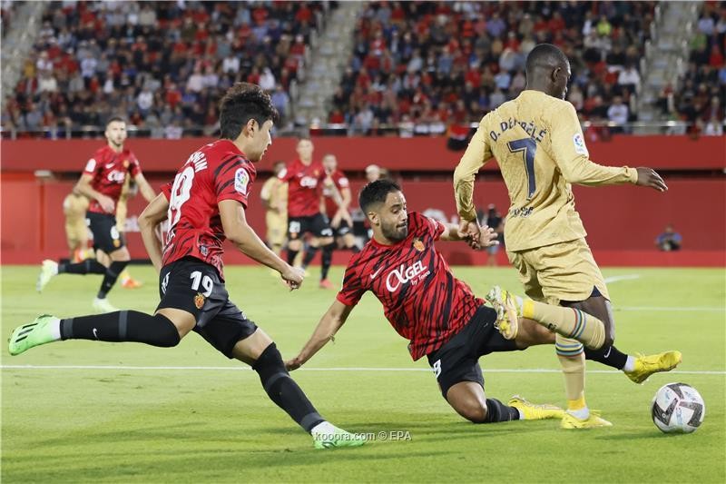 بالصور : برشلونة يعبر مايوركا بصعوبة ويتصدر الدوري مؤقتا