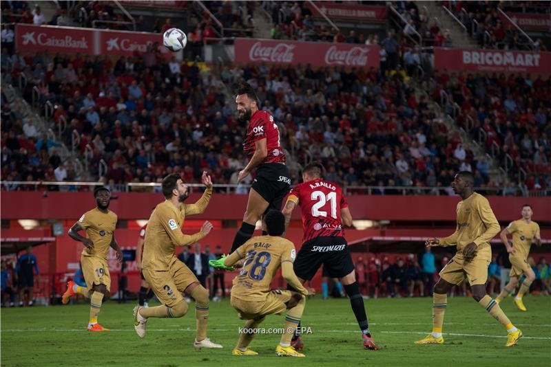 بالصور : برشلونة يعبر مايوركا بصعوبة ويتصدر الدوري مؤقتا