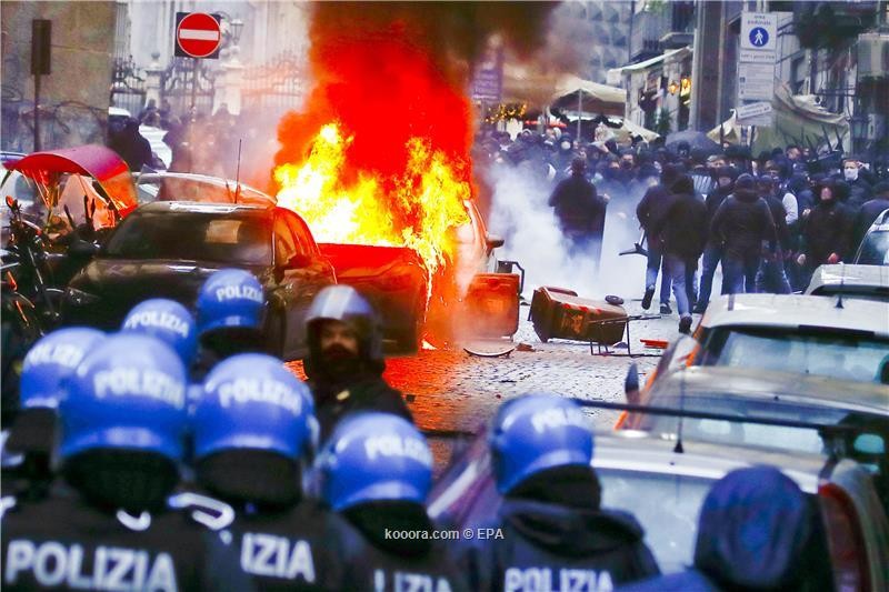 بالصور : أعمال عنف.. إصابات وحرائق في اشتباكات بين جماهير فرانكفورت ونابولي